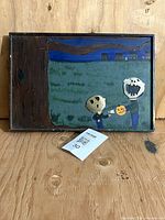 Front of wood panel painting showing Halloween scene