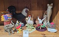 Full group of animal figurines on shelf