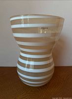 Full view of striped hourglass vase