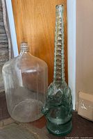 Unicorn bottle and water jug side by side