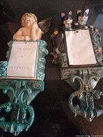 Both door knockers side by side showing full design