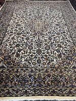 Full view of rug showing entire field and borders