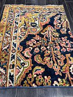 Full view of handmade Persian wool rug