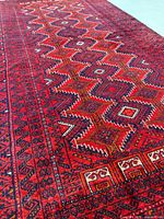 Oblique view showing red field and geometric pattern detail