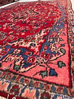 Angled edge view highlighting pile and border colors