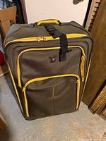 Front view of SwissGear suitcase showing overall design, zippers and logo