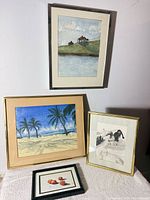 All four framed Lisa Young watercolours displayed together
