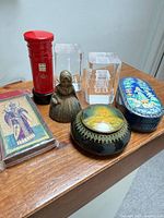 Group shot showing all six souvenir items