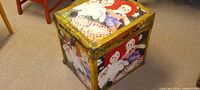 Front and top view of Raggedy Ann motif wood trunk