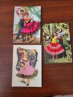 Fronts of all three embroidered Flamenco dancer postcards