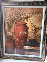 Front view of framed canvas print showing artwork and frame