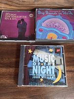 Front covers of the three CDs