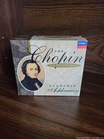 Front view of sealed 5-CD box set