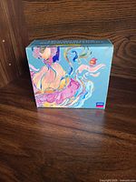 Front view of the box set showing artwork and London logo