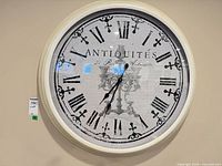 Front view of full clock showing frame, dial and numerals