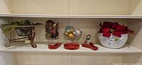 Shelf view showing all eight holiday decor items together