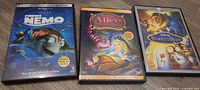 Front covers of all three Disney DVD cases