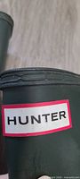 Close-up of Hunter logo on boot shaft