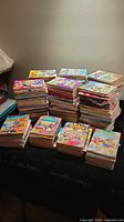 Multiple stacks of Archie digest comics on table