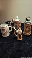 Group shot of four German beer steins