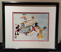 Framed limited-edition Disney Saracel print in mat and black frame