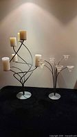 Both candelabras side by side showing overall design and included candles