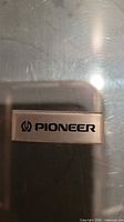 Close-up of Pioneer logo on dust cover