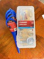 Front view of Husky air hose kit and FloTool funnels