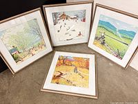 Front view of all four framed Norman Rockwell reproduction prints