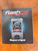 Front of Flashcal F5 box showing product image and branding