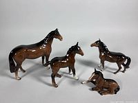 Group shot of all four Beswick horse figurines