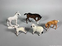 All five figurines grouped