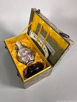 Vase, wood stand and brocade box together in open position