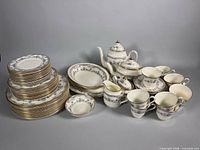 Group view of complete Minton Avonlea china set showing dinnerware and serveware pieces