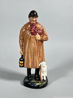 Front view of Royal Doulton figurine showing shepherd, lantern and lamb