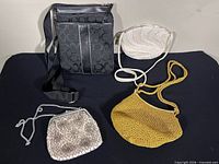 All four bags laid out showing styles and sizes