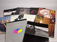 All eleven LPs fanned out showing front artwork