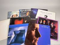 Group shot showing all 10 album covers