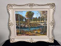 Frontal view of framed oil painting