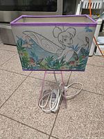 Lamp unplugged showing full structure, printed shade, acrylic base, cord