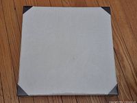 Front of one felt bulletin board with corner protectors