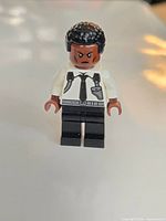 Front view of Lego Young Nick Fury minifigure