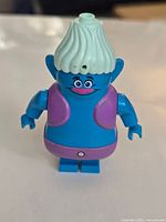 Front view of Biggie minifigure showing colors and condition