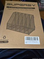 Front of sealed box showing SUPEASY branding, product image, 5 vertical magazine organizer label