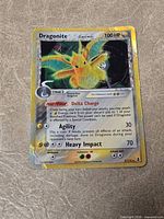 Front of Dragonite holo card showing artwork and set details