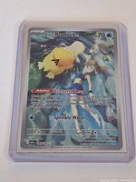 Front of card showing artwork, set info and card text