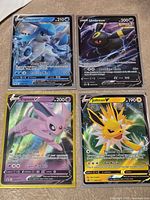 group shot of all four promo cards