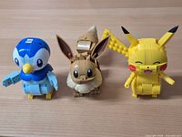 Front view of Piplup, Eevee, Pikachu assembled