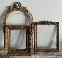 All three ornate gilt wood frames grouped together