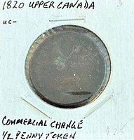 Token in labelled 2x2 flip, handwritten details visible